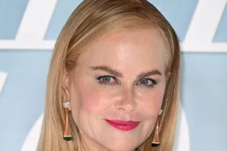 Nicole Kidman in a tight-fitting off-the-shoulder dress appeared at the premiere in London